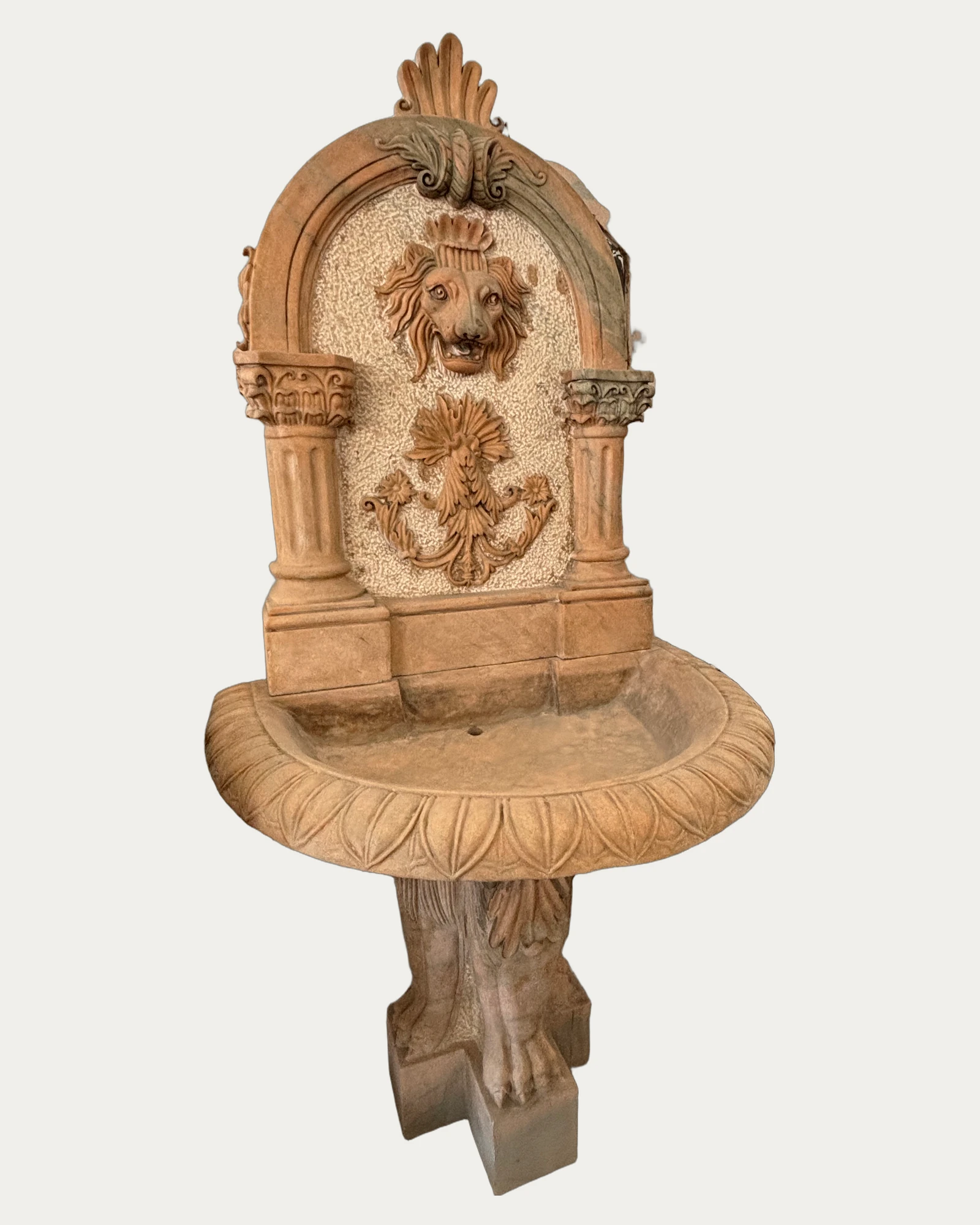 Lion Head Relief Wall Fountain, three-quarter view